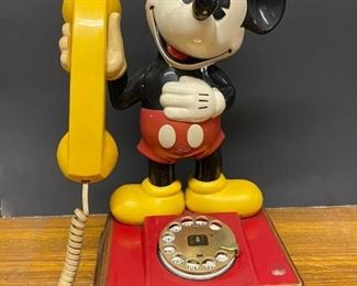 Mid 1970s Mickey Mouse rotary telephone...To Register and To Bid go to https://capitolsalesservices.hibid.com... 