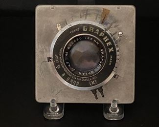 Graphex Lens for 4 x 5 camera.  This came from the Ellis Studio that was once located in downtown Corsicana, TX ...To Register and To Bid go to https://capitolsalesservices.hibid.com... 