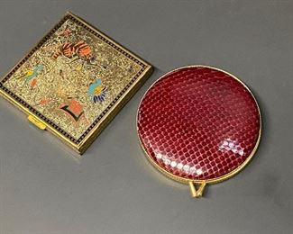 Vintage Volupte  and Yacare ladies powder compact with a mirrors...To Register and To Bid go to https://capitolsalesservices.hibid.com..