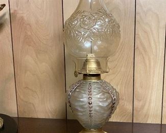 Antique oil lamp ...To Register and To Bid go to https://capitolsalesservices.hibid.com...