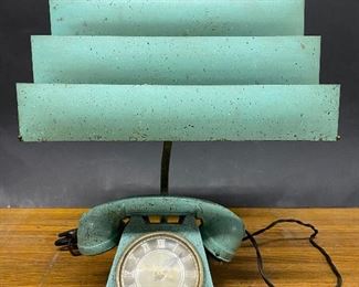 Mid Century Telephone styled clock and lighter  and lamp combination by the Trea Boye Corporation of Brooklyn, NY.   Original metal Venetian shade.  ...To Register and To Bid go to https://capitolsalesservices.hibid.com... 