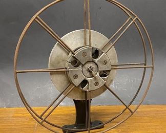 1920's movie film reel wheel rack ...To Register and To Bid go to https://capitolsalesservices.hibid.com... 