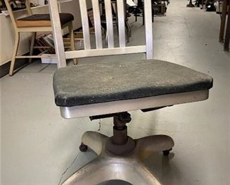 Vintage mid century industrial tanker propeller swivel office chair used by SWBT with a purse hanging attachment on the back.  (Photos by BC of Capitol Sales Services ) ...To Register and To Bid go to https://capitolsalesservices.hibid.com... 