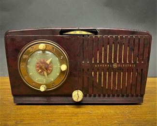 MId century General Electric radio and clock ...To Register and To Bid go to https://capitolsalesservices.hibid.com... 