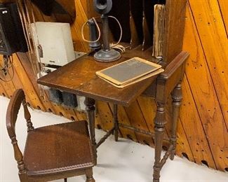1920's telephone drop front desk and chair.  This desk was sold to the American public who wanted to keep their Candlestick telephones hidden.    (Photos by BC)  ...To Register and To Bid go to https://capitolsalesservices.hibid.com... 