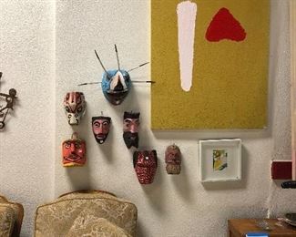 Art by Amoia Studio, Folk art masks from Mexico, New Guinea, etc, pair of Bergere chairs with 1 ottoman