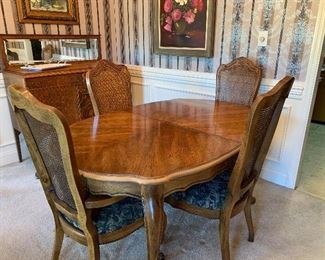 #1 Pecan dining table with cane back 6 chairs (1 arm chair) and 2 leaves. Made in North Carolina 62"-98"x43"x29" SOLD