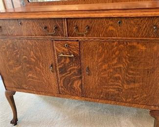 #3 Antique tiger oak beveled mirror buffet with keys on casters. 46"x20"x52" SOLD