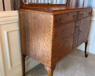 #3 Antique tiger oak beveled mirror buffet with keys on casters. 46"x20"x52" SOLD