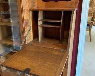 #7 Antique oak side by side wardrobe with drop down desk, keys and on casters. 40"x12"x68" SOLD