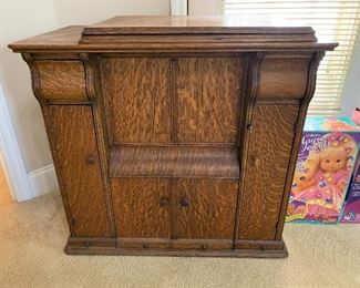 #45 Antique tiger oak sewing machine cabinet with side drawers. 33"x18"x30" SOLD