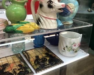 Figural animal cream pitchers 
Convex glass Silhouettes 