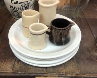 Ironstone plates 
Tiny porcelain cream pitchers 