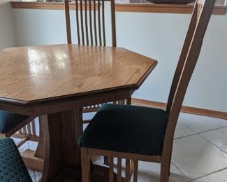 Mission style oak table and four chairs