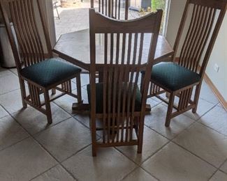 Mission style oak table and four chairs