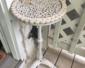 Wrought iron plant stand.
