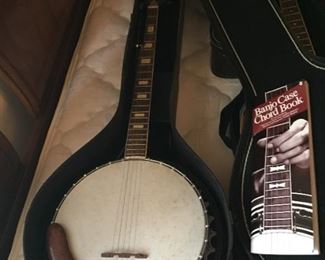 Banjo with case.