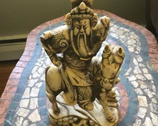 Ivory looking Carving.