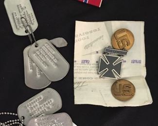 Dog tags and military buttons.