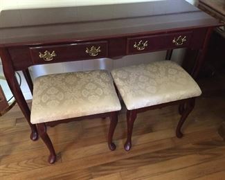 Console table with benches.