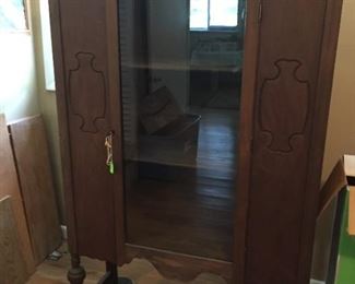 Nice cabinet with glass door.