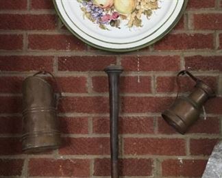 Copper utensils and decorative plate.