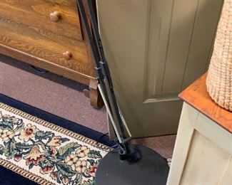 heavy adjustable floor lamp, black,  area rug