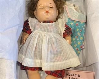 Madame Alexander Doll with 2 dresses, antique