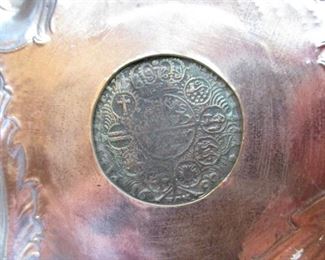 DETAIL OF BEZEL SET COIN DATED 1692