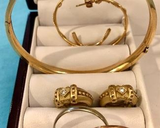 Item 235:  14K gold earrings (bottom): $155                                               Item 236:  14K gold bangle: SOLD                                                                  Item 237:  14K and diamond earrings: $325                                                 Item 238:  Rolling Ring: SOLD