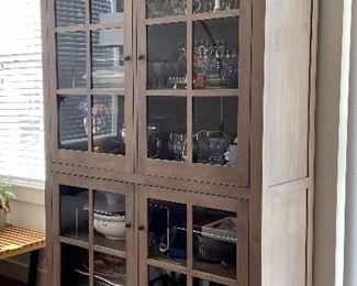 Item 7:  "Adams" Room and Board Display/China Cabinet - 50"l x 18"w x 76.25"h:  $945 shows the elegance of Shaker design with details like tapered legs and frame-and-panel doors. Each cabinet is crafted from solid wood and the highest quality U.S. and imported materials and is signed by the West Virginia artisans who built it. 