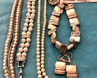 Item 118: Long Pearl and Silvertone Box Chain Necklace: $35 Item 119: Mother of Pearl Stretch Bracelet and Earrings: $24
Item 120: Pearl Strand: $24 Item 121: Double Strand Pearl and Swarovski Crystal Bracelet: $34