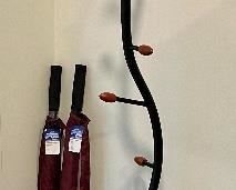 Item 194: (2) Oversized Umbrellas (left): $8/Ea Item 195: Metal Coat Tree - 71" (right): SOLD