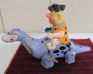 1962 Fred Flintstone Riding Dino Tin Toy - Mar Line Toys