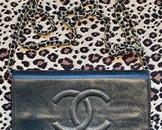 Item 330:  Chanel Wallet on Chain (condition issues on the interior - lining fabric separating from leather in back zippered pocket):  $425