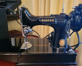Item 335:  Singer Sewing Machine Model 221:  $250