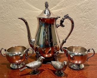 Item 57:  Oneida Silverplate Coffee Pot and Sugar & Creamer:  $125                                                                                                                Item 58:  (2) Sterling Silver Bird S&P shakers - 2":  $225 for pair                                 