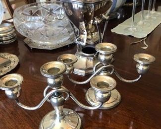 Sterling candleabras, silver plate kettle on stand, Simon Pearch candlesticks, Waterford bowls etc.