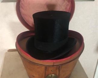 19th C beaver top hat unoriginal leather case ( with Cunard travel ticker on top )