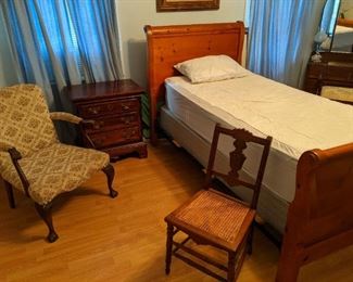 Twin bed with wood frame (if interested please ask to see), end table, wooden chair, upholstered chair