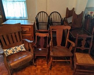 Wood rocking chairs (far left rocker is sold)