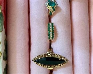 Just add it to the sale 14 karat gold jewelry beautiful rings sapphires and rhymes amethyst angel skin coral along with sterling costume celery and some old-time medals