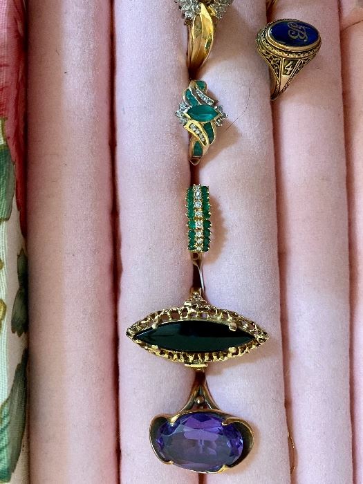 Just add it to the sale 14 karat gold jewelry beautiful rings sapphires and rhymes amethyst angel skin coral along with sterling costume celery and some old-time medals