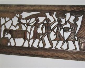 Hydro carved placque above bed