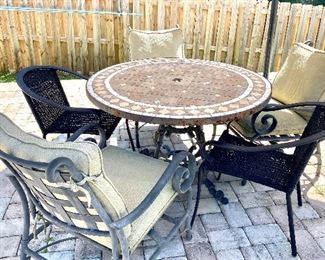 9-	Outside table tile top with 5 chairs 4”R, 3 rockers, 2 wicker		$250