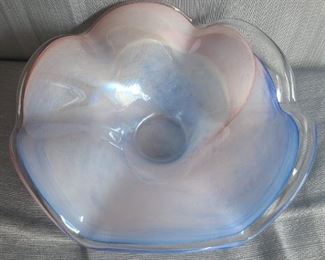 Hand-blown on the island of Murano, Italy, this beautiful "flower bowl" is a unique show piece that will enhance  any room - especially beautiful when displayed on a glass shelf or table