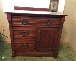 Beautiful like oak wash stand with commode door.  Look at the hardware.