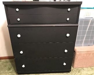 This is a vintage dresser that has been painted.  Very attractive and fun.