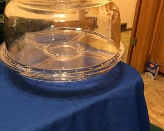 This is an unusual cake plate stand and dome.  Turn plate over and you have a server for chips and dip, vegetables, little sandwiches, desserts etc.