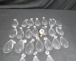 24 Glass Prisms & Glass Finial
- 2 are chipped
- 1 Missing the top